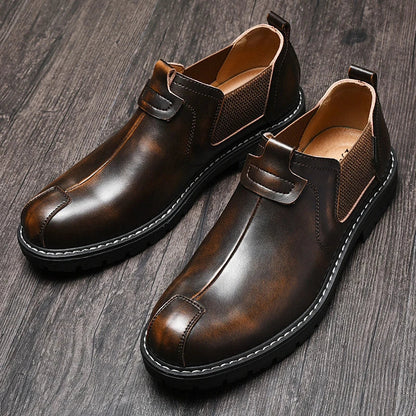 Elegant men's British-inspired Martin boots in genuine cowhide leather with thick soles and middle heels for outdoor comfort and style