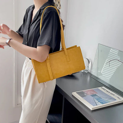 A premium polyester tote bag in a variety of colours, featuring a stylish Japanese and Korean-inspired design for the modern British shopper.