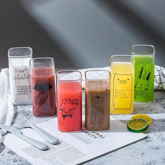 Charming glass drinking glasses with playful animal designs, including a pig, ideal for adding a touch of whimsy to UK homes
