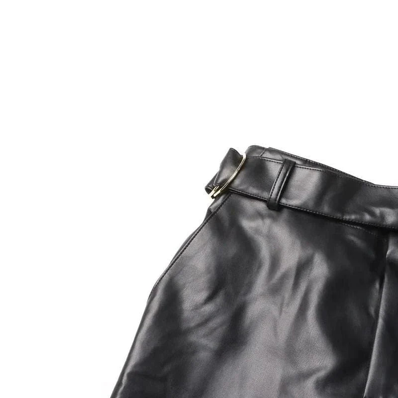 A pair of high-waist leather cargo pants with a stylish patchwork design, offering a blend of functionality and fashion for modern women.