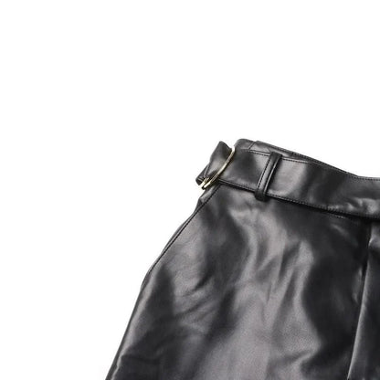 A pair of high-waist leather cargo pants with a stylish patchwork design, offering a blend of functionality and fashion for modern women.