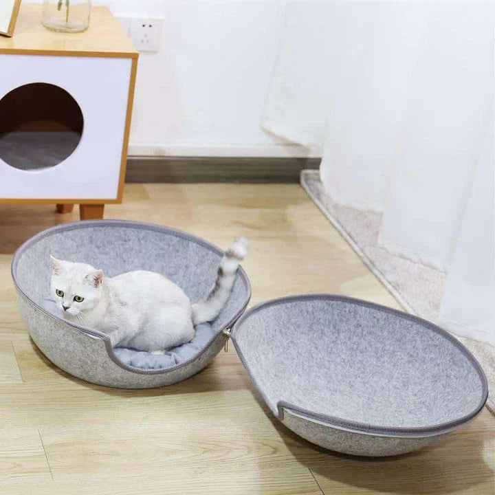 Cosy and comfortable egg-shaped pet bed with plush, supportive padding for your furry friend's relaxation