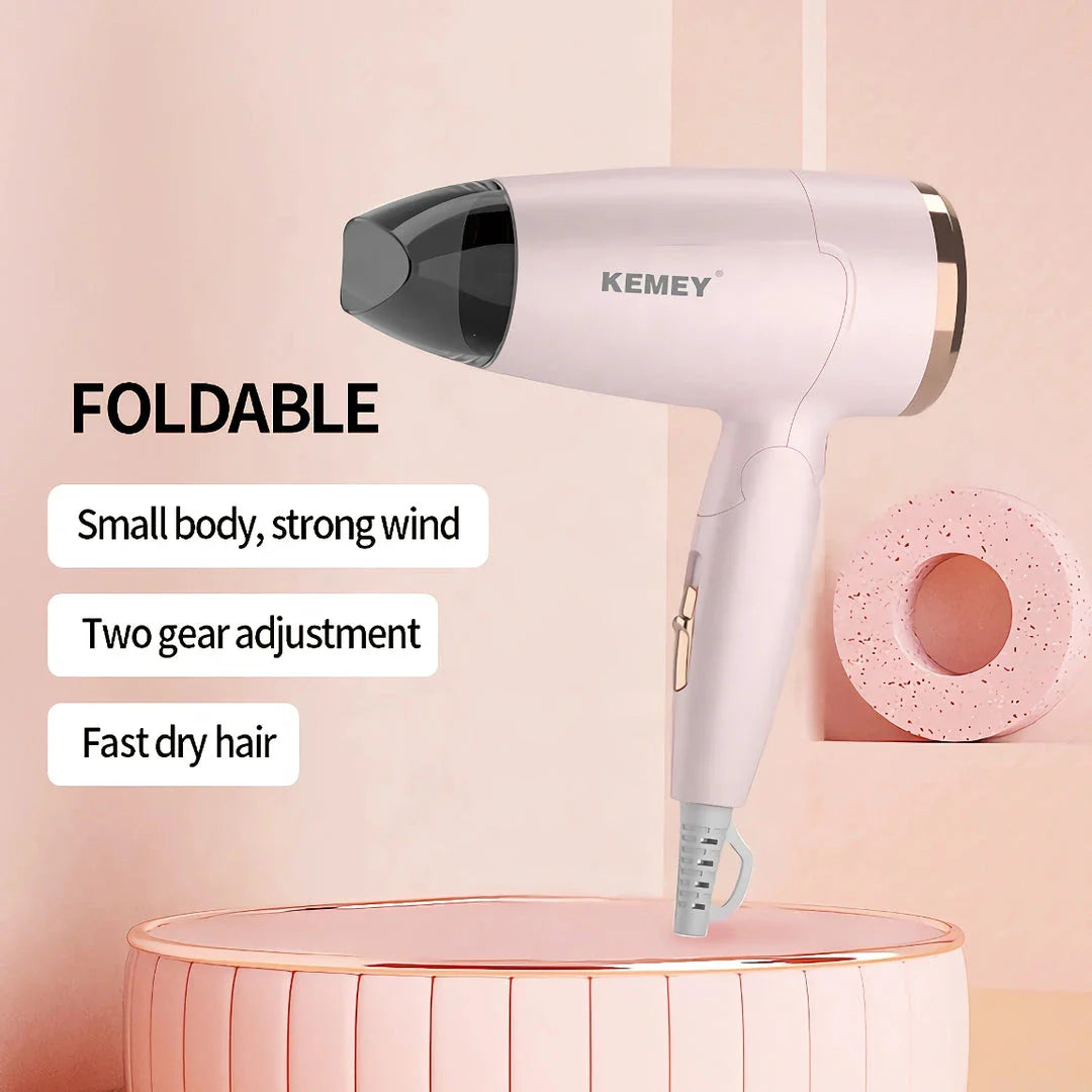 Compact foldable hair dryer with powerful 950W motor, adjustable settings, and lightweight, portable design for travel and student use