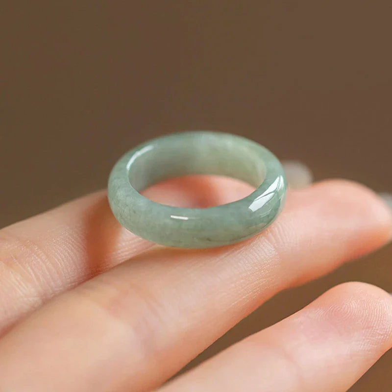 Elegant and minimalist natural jade ring with a smooth, waxy texture and a range of inner diameters for a comfortable fit