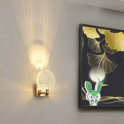 Elegant crystal LED wall lamp with copper body and glass shade, offering warm, cool, and neutral lighting modes for versatile home decor