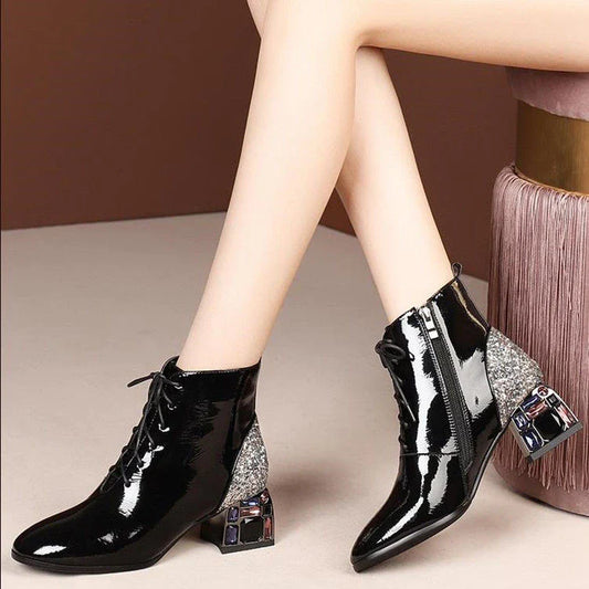 Elegant rhinestone embellished patent leather high heels in a wine red colour