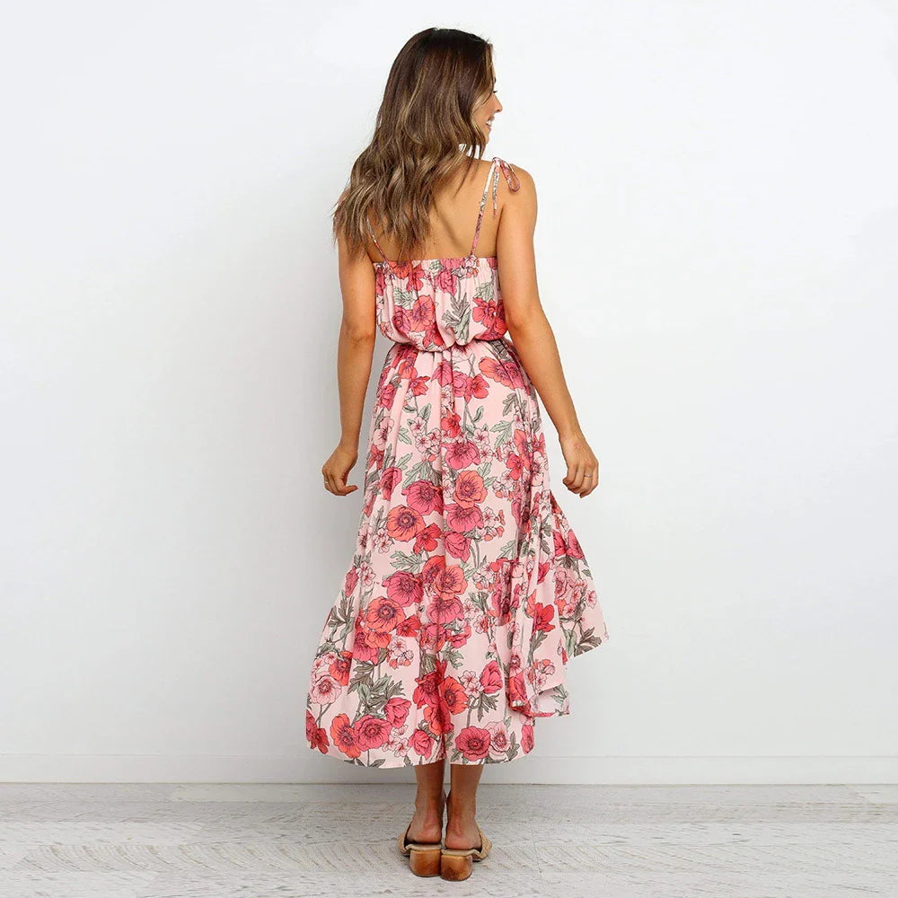 Printed camisole dress with a flattering mid-length swing skirt and a high-waisted design for a stylish, figure-enhancing look.