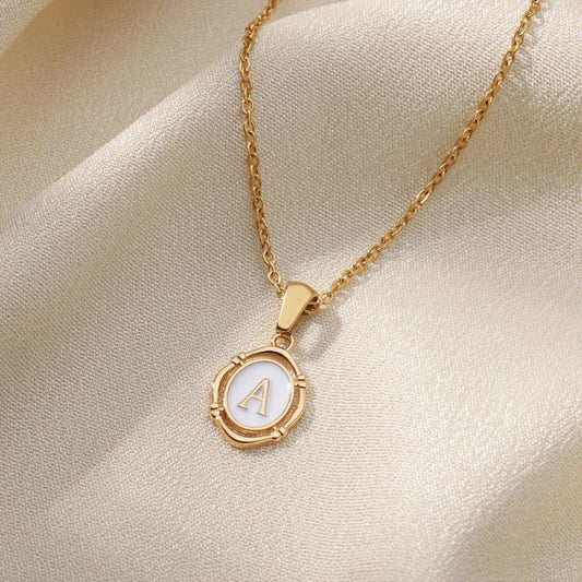 Elegant gold-tone letter pendant necklace with innovative drip oil design and integrated fitness tracker