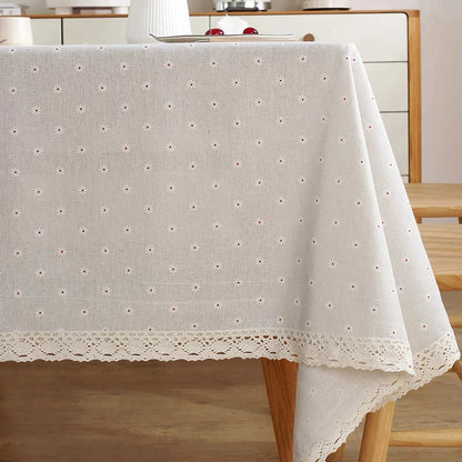 Elegant polyester linen tablecloth with delicate lace edging, available in various sizes for a sophisticated dining experience.