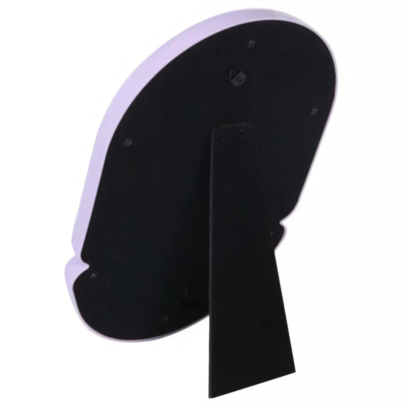 Elegant irregular oval-shaped tabletop mirror with sleek black plastic frame, perfect for adding sophisticated style to home décor
