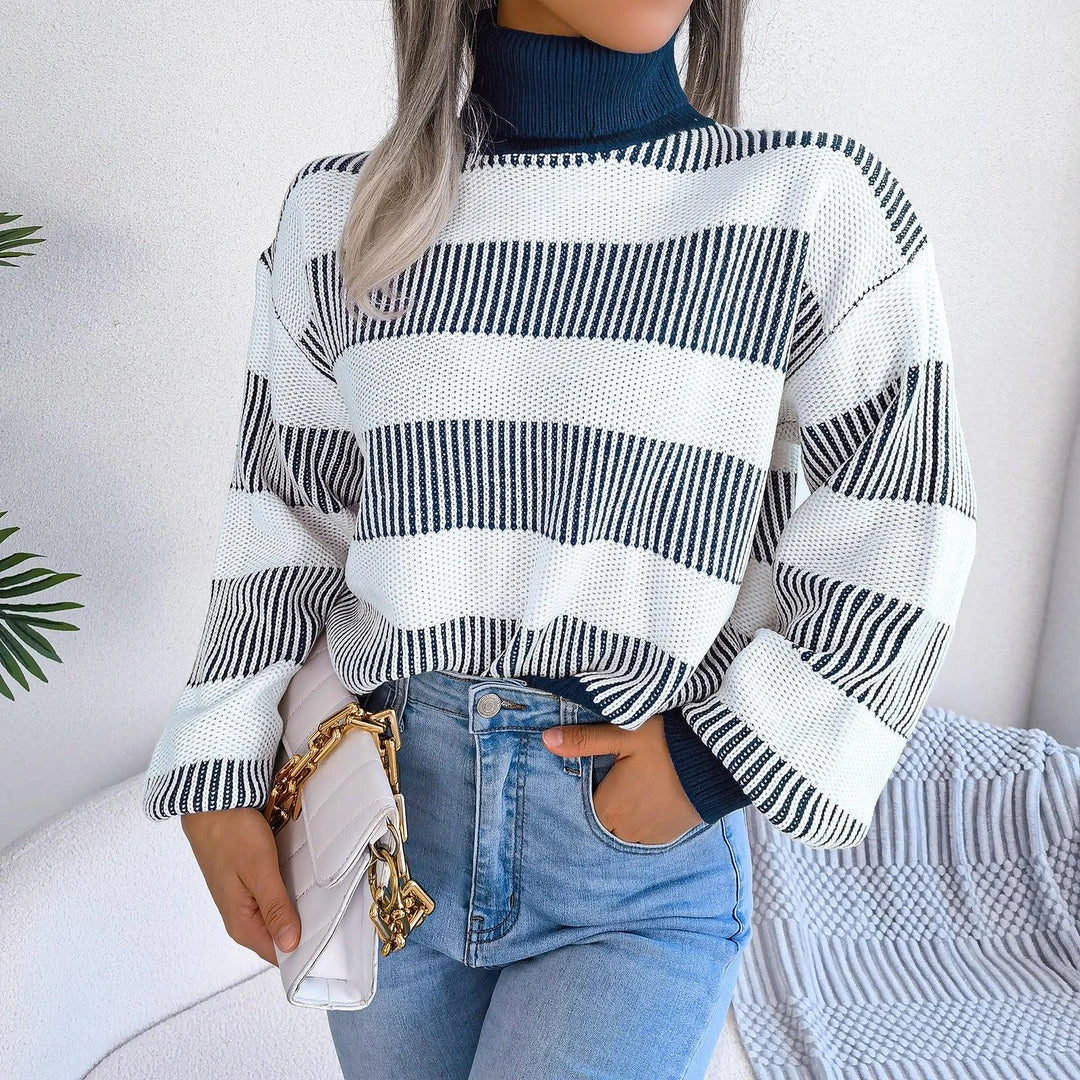 Cosy and stylish high-neck striped sweater in various colours, featuring lantern sleeves and a relaxed fit for all-day comfort.