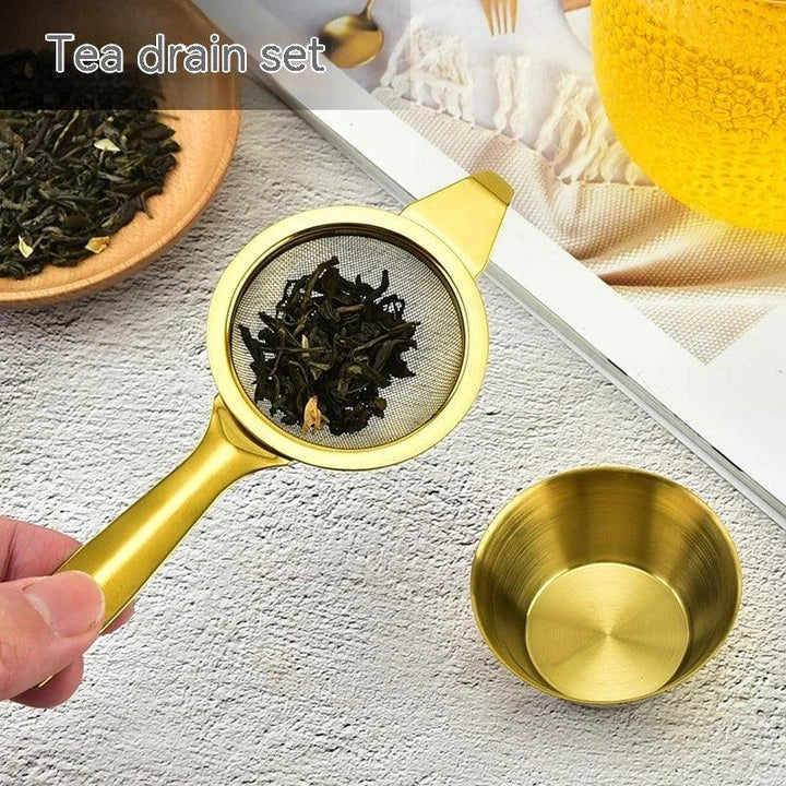 Stainless steel tea infusers with gold-tone finish in a modern, minimalist design
