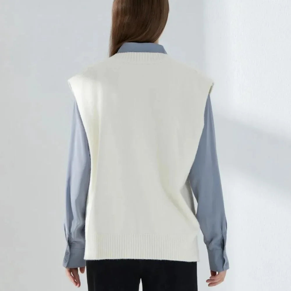 Cosy oversized knitted vest in various colours, featuring a sleeveless V-neck design for versatile layering