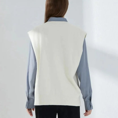 Cosy oversized knitted vest in various colours, featuring a sleeveless V-neck design for versatile layering