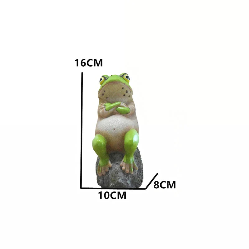 Charming frog garden figurines in various mischievous poses, adding a playful touch to outdoor decor