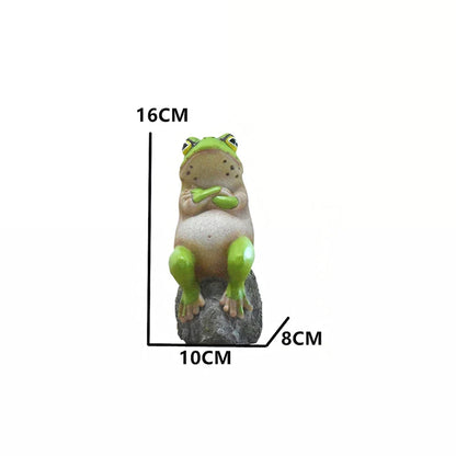 Charming frog garden figurines in various mischievous poses, adding a playful touch to outdoor decor