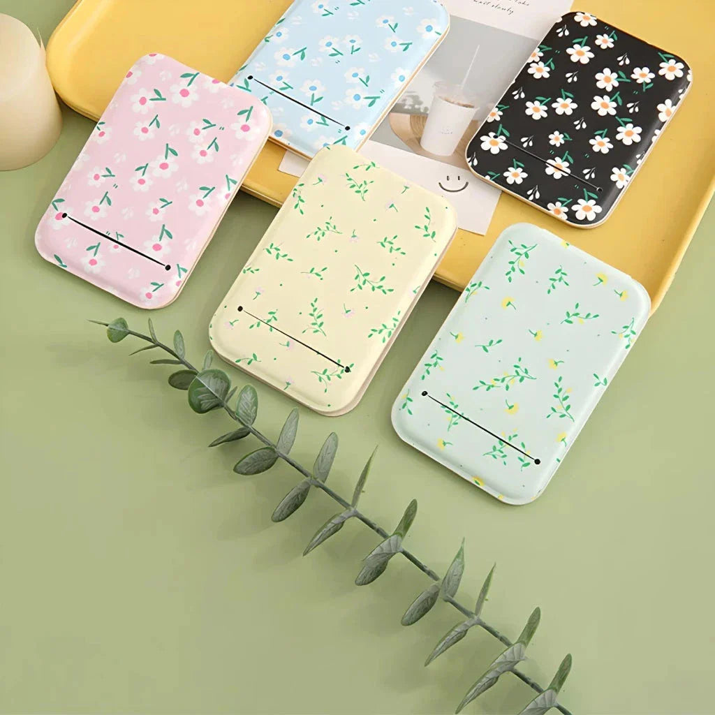 Elegant floral folding makeup mirror with a unique design and clear, distortion-free reflection