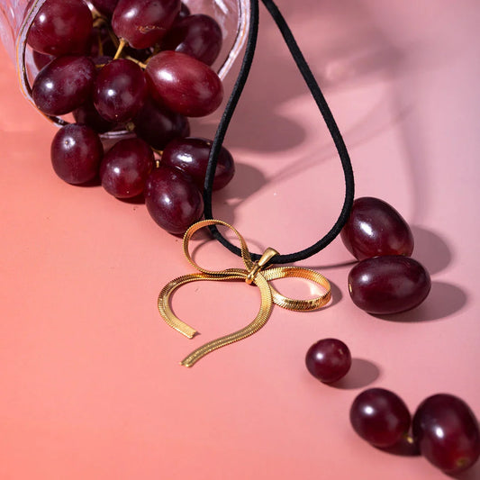 18K gold plated bowknot snake bone chain necklace with a sleek, elegant design