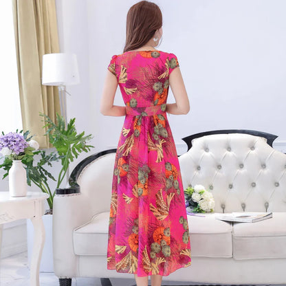 A graceful chiffon dress with short sleeves and a floor-sweeping hem, featuring a delicate printed pattern for a sophisticated, elegant look.