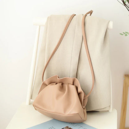 Chic retro dumpling bag made with soft, premium PU material in a one-shoulder diagonal design