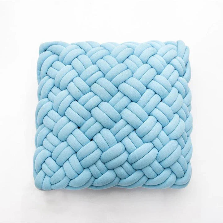 Handmade cotton throw pillow with unique knotted design in a sky blue colour