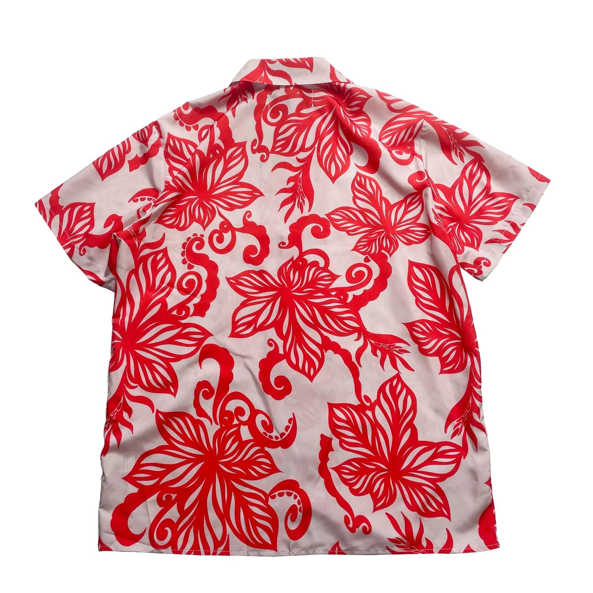 A stylish red short-sleeve shirt with a retro vine print pattern, perfect for casual British-inspired fashion.