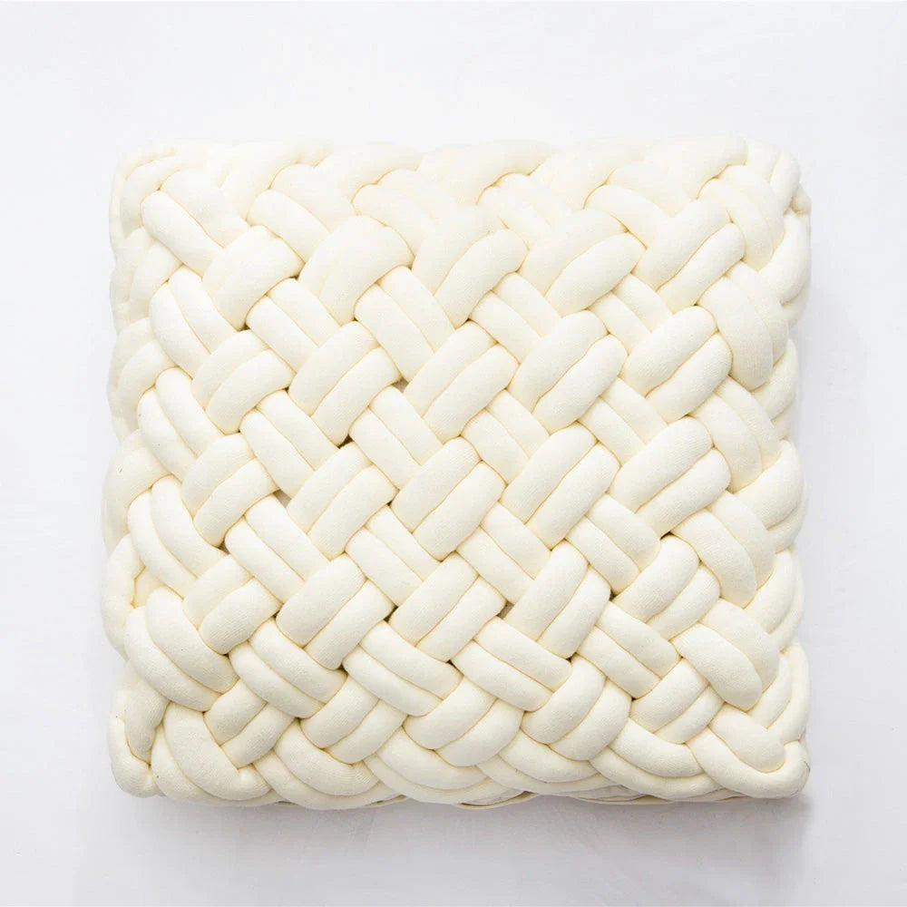 Handmade cotton throw pillow with unique knotted design in a sky blue colour