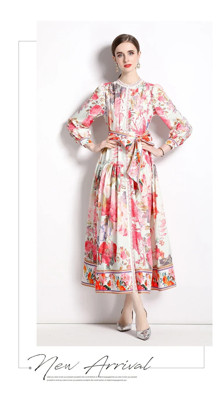 Elegant floral single-breasted swing dress with delicate print, tailored design, and flowing silhouette