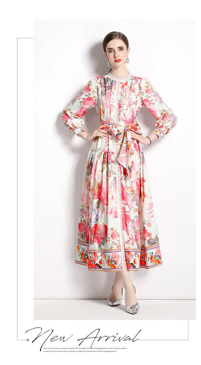 Elegant floral single-breasted swing dress with delicate print, tailored design, and flowing silhouette