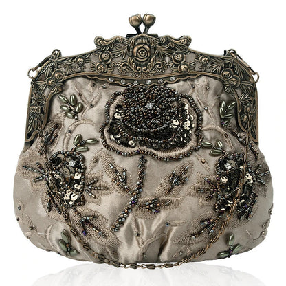 A black cosmetic bag with exquisite bead embroidery, featuring a silk surface and nylon fabric texture for a luxurious feel.