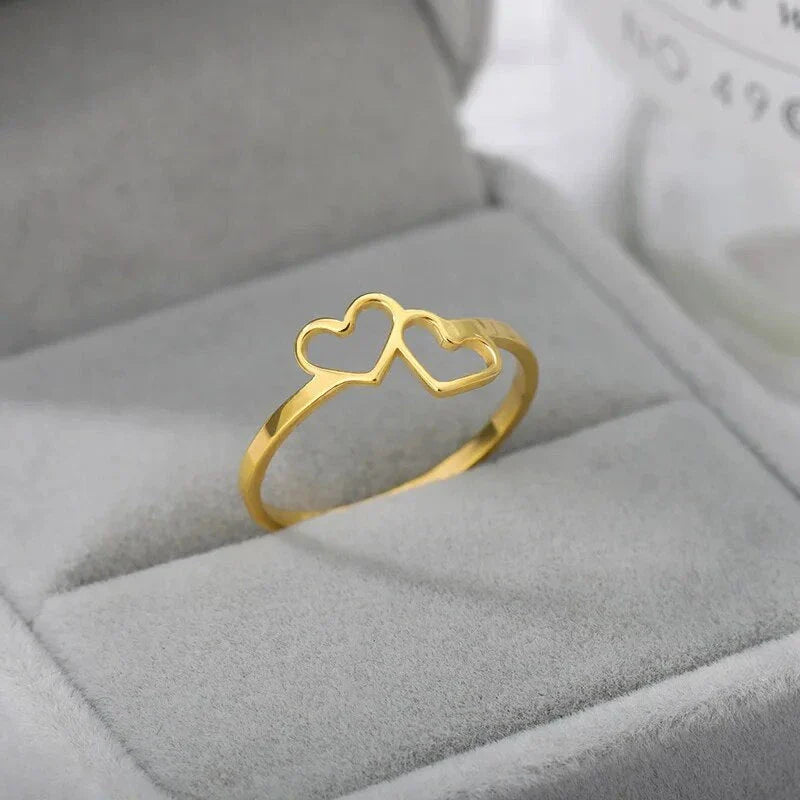Elegant heart-shaped love ring in stainless steel and copper, a timeless and versatile piece of bridal jewellery