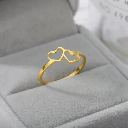 Elegant heart-shaped love ring in stainless steel and copper, a timeless and versatile piece of bridal jewellery