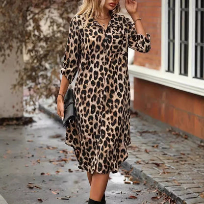 Elegant leopard print beach cover-up dress with A-line silhouette, loose waist, and pockets for comfortable and stylish holiday wear