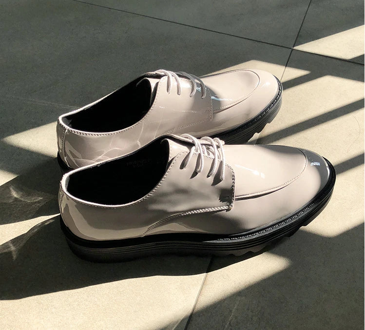 Premium microfiber leather casual shoes with thick rubber sole, low-top design, and striking Korean-inspired details