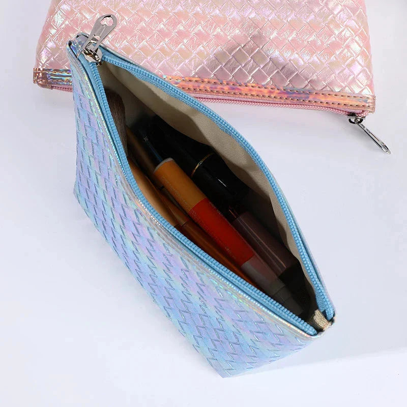 Large leather travel cosmetic bag with stylish paillette pattern, perfect for organising makeup and toiletries on the go