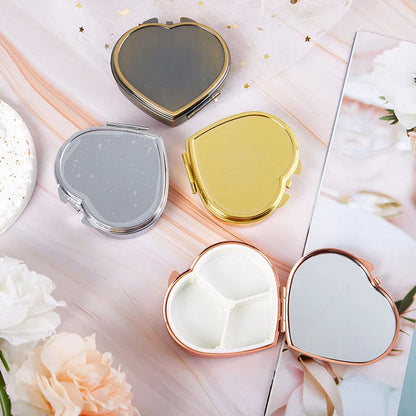 Heart-shaped metal pill box with built-in mirror for convenient storage and touch-ups on the go