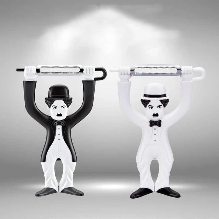 Vintage-inspired plastic fruit and vegetable peelers featuring the iconic silhouette of Charlie Chaplin's Tramp character