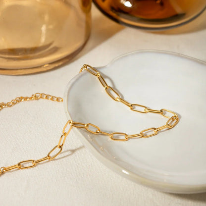 Elegant 18K gold-plated stainless steel paper clip chain anklet with minimalist, sophisticated design