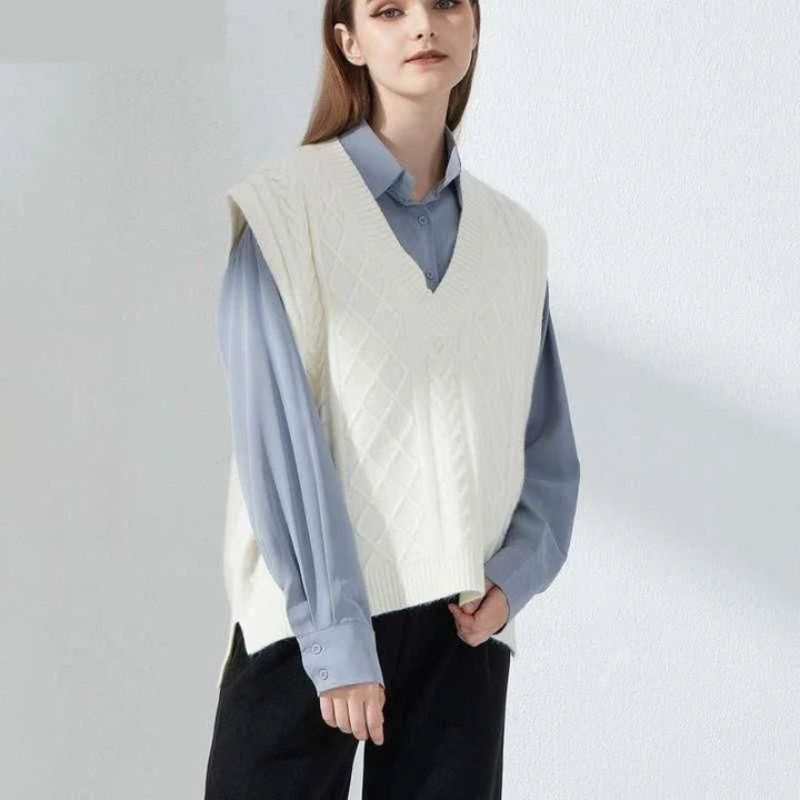 Cosy oversized knitted vest in various colours, featuring a sleeveless V-neck design for versatile layering