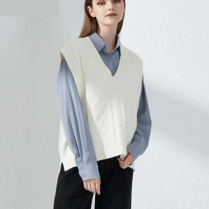 Cosy oversized knitted vest in various colours, featuring a sleeveless V-neck design for versatile layering