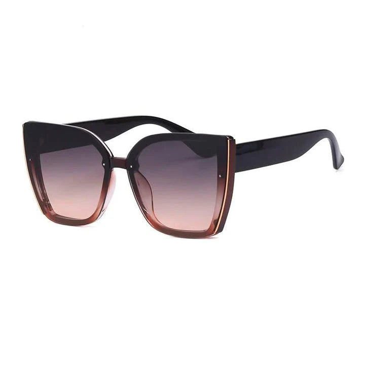 Chic oversized cat eye sunglasses with a vintage-inspired design and UV400 protection for stylish British women