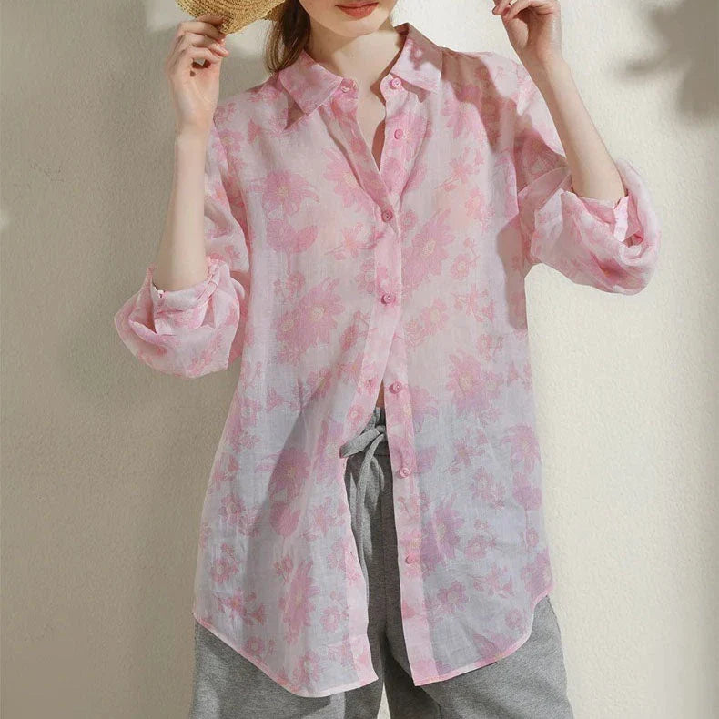 Elegant floral print ramie blouse for professional women, featuring a charming pattern, breathable fabric, and a polished silhouette.
