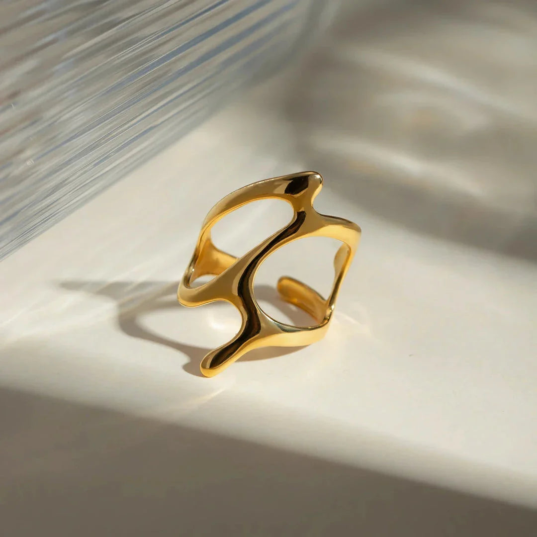 Chic stainless steel ring with irregular geometry design and 18K gold plating
