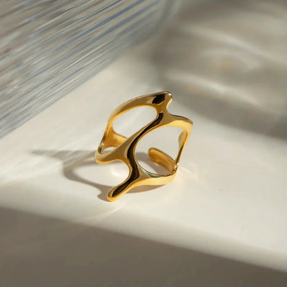 Chic stainless steel ring with irregular geometry design and 18K gold plating