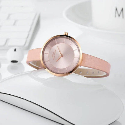 Elegant and water-resistant ladies' fashion watch with a sleek, thin design and premium leather strap