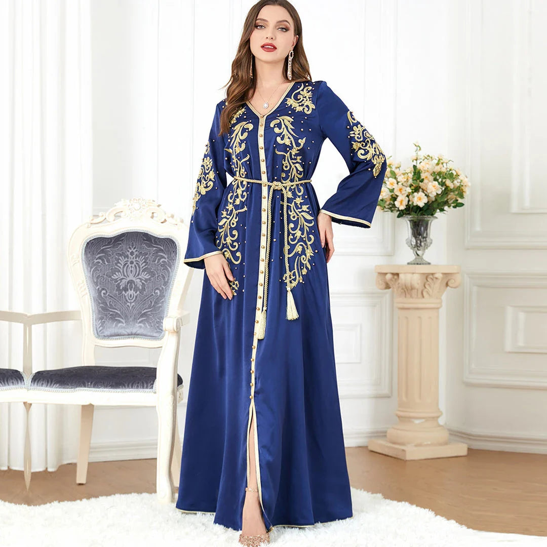 A sophisticated long-sleeve women's dress with a captivating floral embroidery pattern and a refined colour palette, suitable for a variety of occasions.