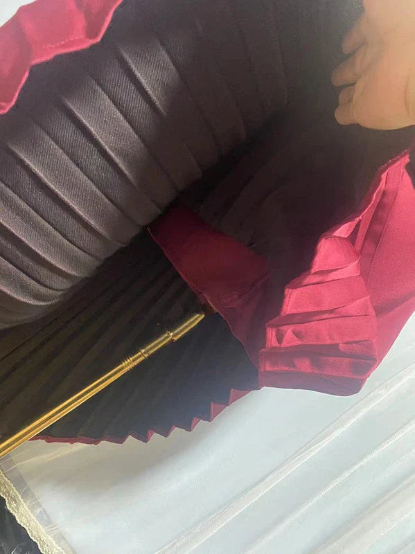 Elegant asymmetric dress in wine red and milky white with a half turtleneck design, perfect for autumn and winter wear.