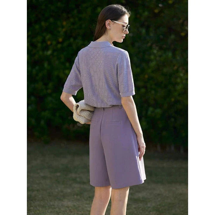 Elegant wide-leg shirred shorts in deep blue, designed for the modern British woman