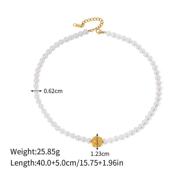 An elegant 18K gold-plated stainless steel bracelet featuring a flower ball design with a lustrous pearl centre