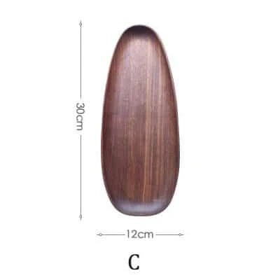 Elegant wooden dining plates with a minimalist, laconic design and natural wood grain
